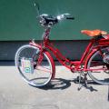 Retro red bike with combustion engine